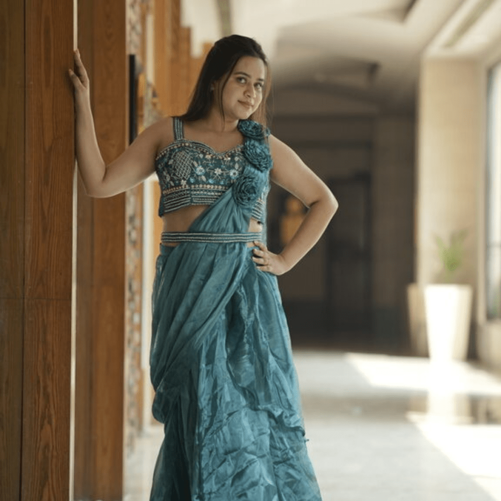 cute girl showing skyblue saree